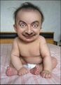 Baby with Mr. Bean's face.