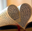 Pages of the Quran made into a heart shape.