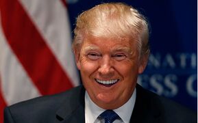 Donald Trump laughing.