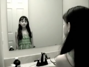 Creepy grudge ghost girl in the mirror.png